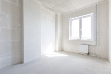interior of the apartment without decoration in gray colors
