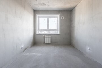 interior of the apartment without decoration in gray colors
