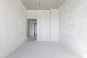 interior of the apartment without decoration in gray colors