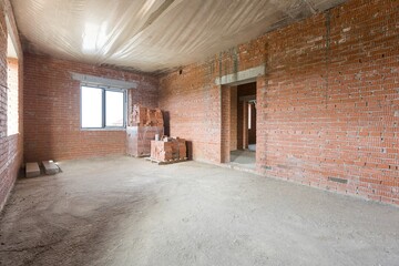 interior of the apartment without decoration in gray colors