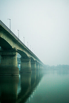 Bridge Over River Against Clear Sky