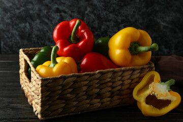 Concept of tasty food with bell pepper on wooden table