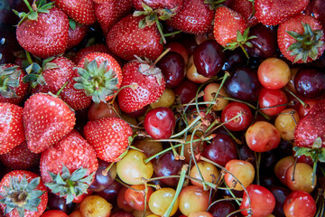 Strawberries and cherries yellow and black
