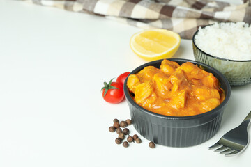 Concept of tasty food with chicken tikka on white background
