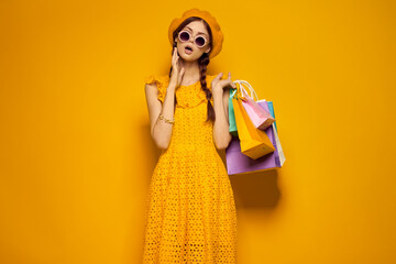 smiling woman wearing sunglasses posing shopping fashion isolated background