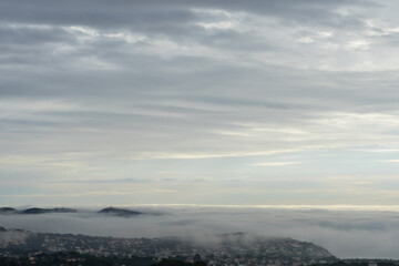 misty morning and clouds on the Mediterranean coast in Spain beautiful sky and foggy landscape