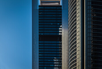 Closeup of modern building tower in Madrid, Spain