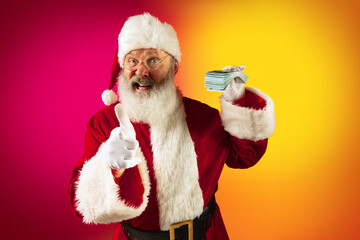 Portrait of emotional Santa Claus wishes wealth and prosperity to every family in New Year 2022....