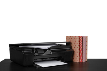 Office table with laser printer and books against white background