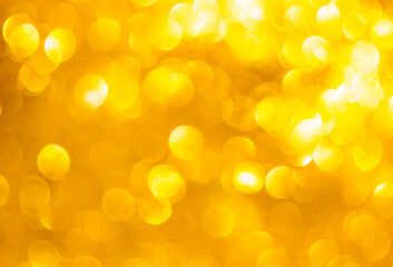 Festive abstract golden lihgts bokeh shiny background