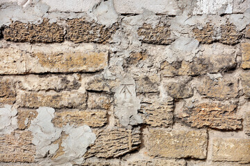 The texture of the old wall, lined with shell stone.