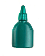 jar of green paint on white background