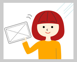 窓ふきをする女性