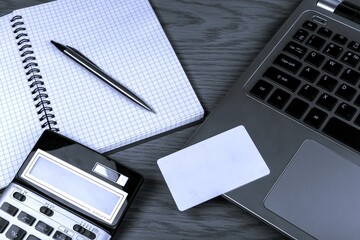 Calculator by notebook and laptop