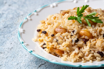 Traditional delicious Turkish food; Almond rice pilaf (Turkish name; Bademli pirinc pilavi)