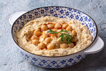 Hummus, chickpea on plate, traditional delicious Turkish food (Turkish name; Humus)