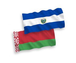 National vector fabric wave flags of Republic of El Salvador and Belarus isolated on white background. 1 to 2 proportion.