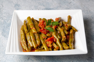 Traditional delicious Turkish food; Green beans with olive oil; Turkish name; Zeytinyagli taze fasulye