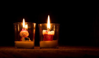 Burn a candle in a snowman-shaped glass at Christmas.