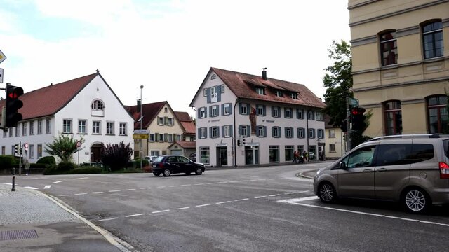 WANGEN, GERMANY - Aug 31, 2021: A time-lapse of a street in Wangen in the Allgaeu with a cloudy sky and a few historical hoses