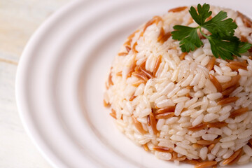 Traditional delicious Turkish food; Turkish style rice pilaf (Turkish name; Arpa sehriyeli pirinc pilavi)