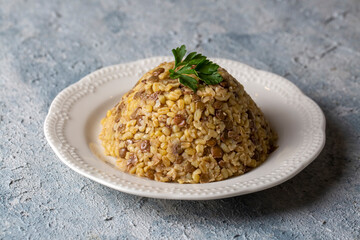 Traditional delicious Turkish foods; bulgur pilaf with green lentils (Turkish name; yesil mercimekli bulgur pilavi)