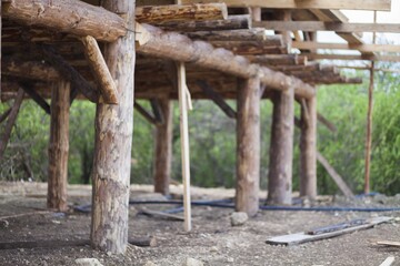 Building Attic Interior. Roofing Construction Indoor. Wooden Roof Frame House Construction.