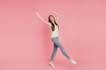 Full-length photo of young woman happy positive smile have fun playful isolated over pink color background