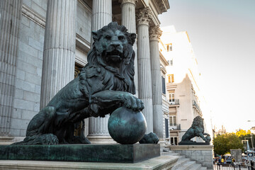 Spanish parliament (Congreso de los diputados) famous facade with two lions sculptures at each...