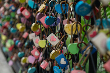 There are many love locks on the wall
