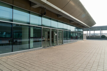 Panoramic skyline and buildings with empty concrete square floor