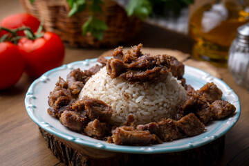 Fototapeta na wymiar Turkish Meat Et Kavurma with rice - pilav (Turkish name; kurban kavurma)