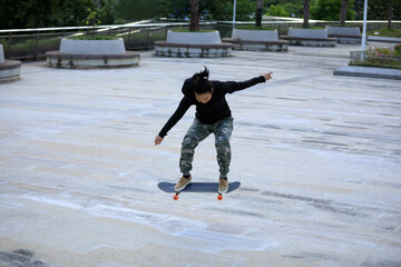 Skateboarder skateboarding outdoors in city