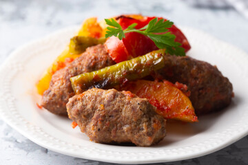 Traditional Homemade Turkish Food Kofte - Kofta with Tomato Sauce and Potatoes. (Turkish name; Izmir kofte)