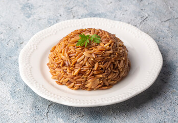 Traditional delicious Turkish dish, barley noodle pilaf (Turkish name; Arpa sehriye pilavi)