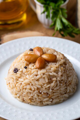 Traditional delicious Turkish food; Almond rice pilaf (Turkish name; Bademli pirinc pilavi)