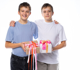 teenagers give gifts for New Year and Christmas. boys congratulate loved ones. isolated white background