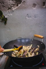 frying pan with aubergine and oyster mushrooms vegetables frying preparing meal cooking dinner lunch delicious tasty vegan meal