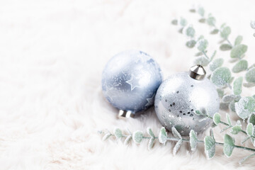 Golden christmas balls with wool background.