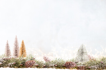 Christmas ornament with string lights on blue background.