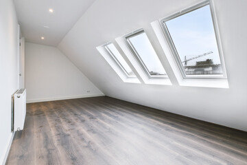 Beautiful bright attic for a room with cute windows