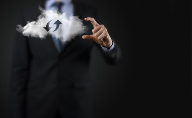 Cloud technology. Polygonal wireframe cloud storage sign with two arrows up and down on dark ....