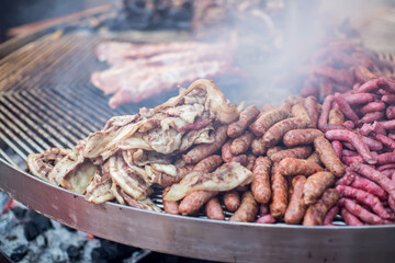 Grilled sausages in the process of cooking outdoor