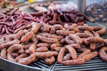 Grilled sausages in the process of cooking outdoor