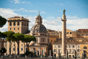 Fototapeta premium View on column of Traijan, church Santa Maria de Loreto, Trajan Forum and pine trees in Rome