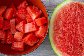 Half Watermelon and chunks of watermelon ready to eat