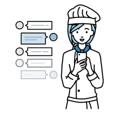 立ってスマートフォンで楽しくチャットで会話する調理師の女性