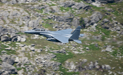 Military Aircraft in Flight. Low Level Attack and Evasion Mountains