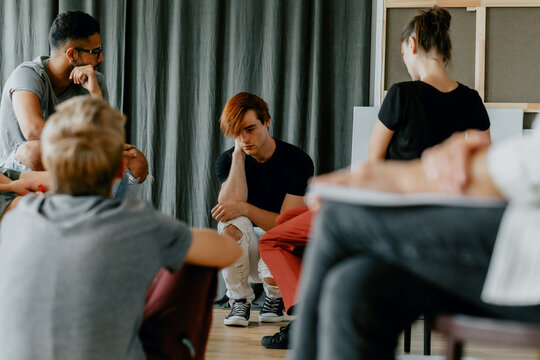 Worried boy in group