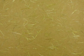 和紙テクスチャー背景(黄土色) 青朽葉色に白い楮の繊維がある和紙